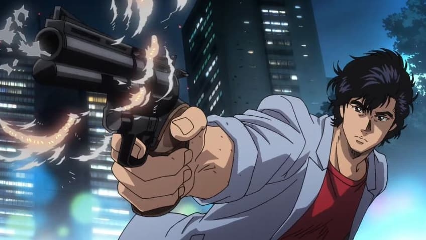 Ryo Saeba, le protagoniste de City Hunter, brandissant son pistolet avec détermination dans une scène d'action nocturne.